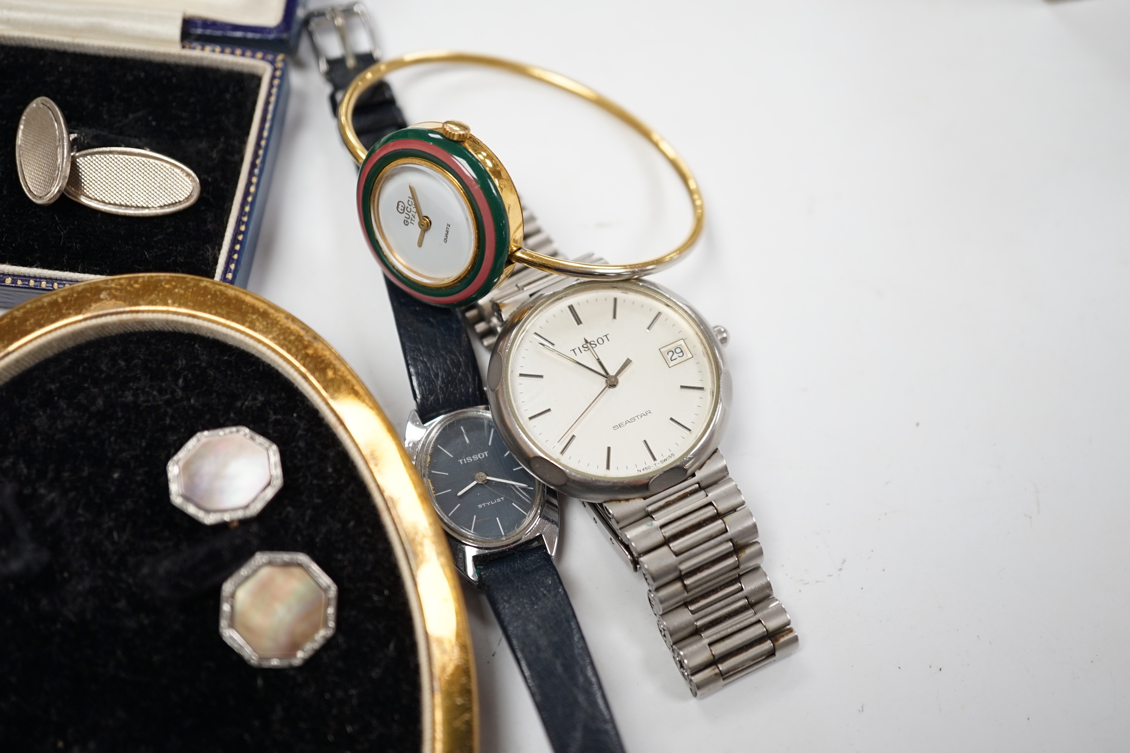 A late Victorian silver open face pocket watch, by J.W. Benson, a Swiss white metal fob watch, a lady's Gucci watch with interchangeable bezels, a pair of engine tuned silver cufflinks, and other sundry watches and jewel